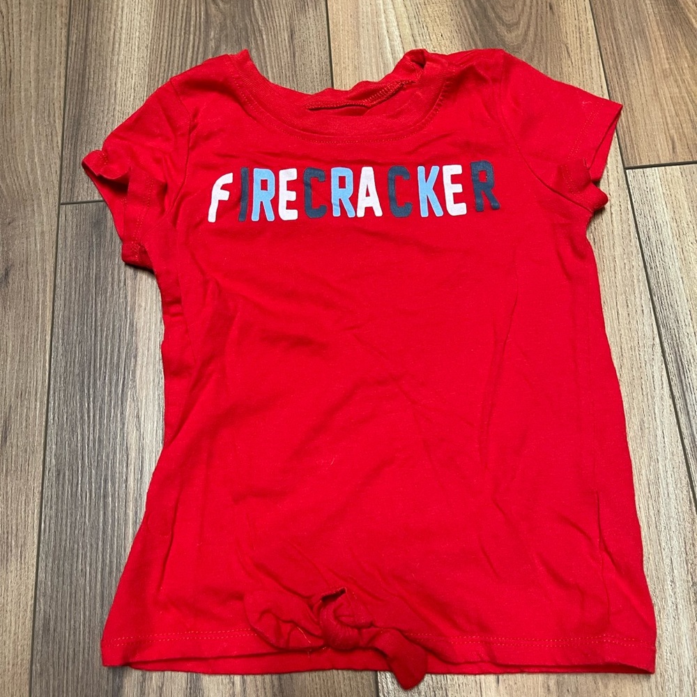 Little girl, short sleeve shirt, firecracker